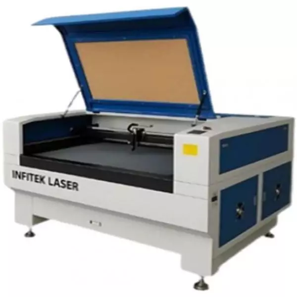MDF Laser Cutting Machine Operating On Wooden Sheets In A Workshop