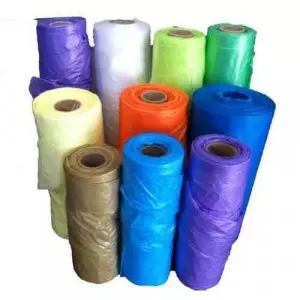 Rolls Of High-Density Polyethylene Plastic Material Stacked In Warehouse