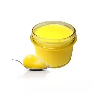 Container Of Pure Ghee Showing Golden Color And Smooth Texture