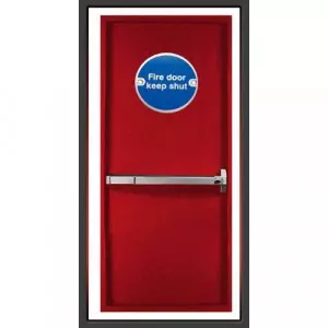 Steel Emergency Door Installed In A Commercial Building Corridor