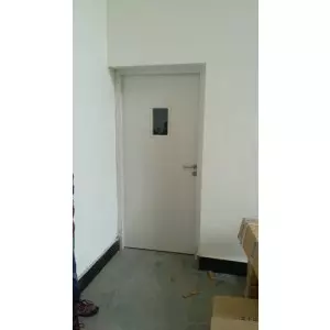 Metal Fire Door Installed At Commercial Building Showing Robust Frame And Secure Locking Mechanism