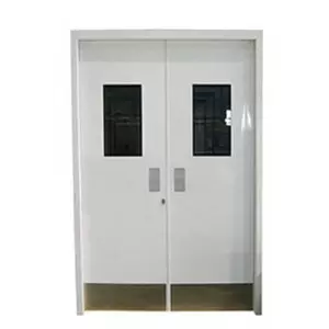 Steel Emergency Exit Fire Door Installed In Commercial Building Showing Sturdy Frame And Metal Panels