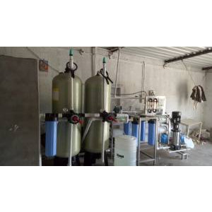 Industrial Water Treatment Plant Setup With Control Panel And Filtration Units