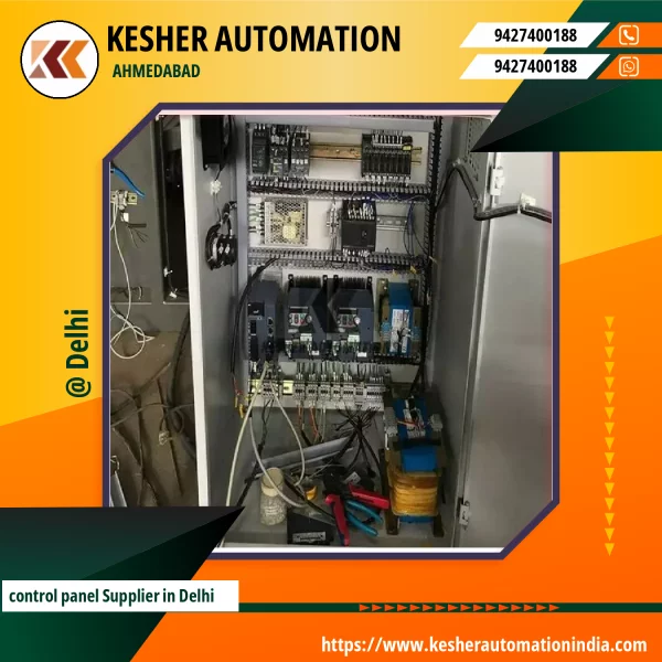 Industrial Electrical Control Panel With Multiple Switches And Wiring Inside Metal Cabinet