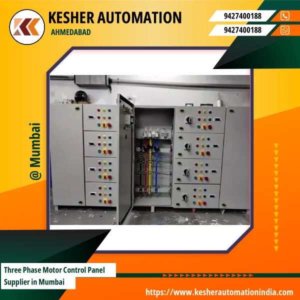 Three Phase Motor Control Panel Installed In An Industrial Setting Showing Wiring And Switches