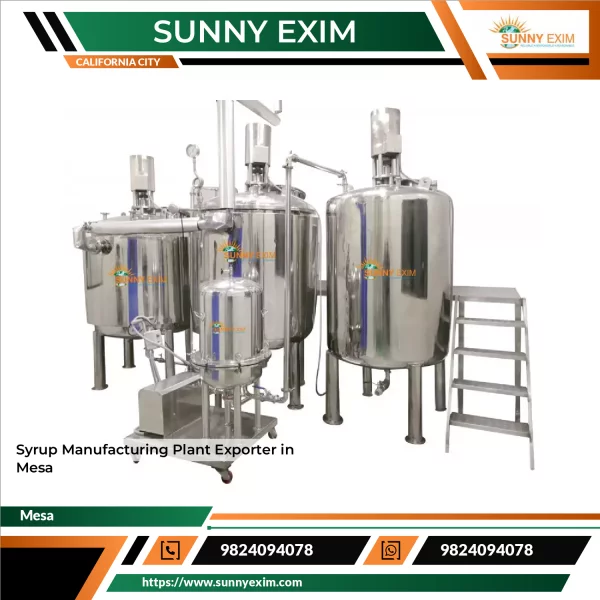 Syrup Manufacturing Plant Machinery Setup Showing Stainless Steel Tanks And Filling Lines