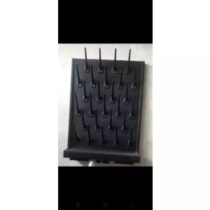 Laboratory Pegboard Installed On Wall With Hooks Holding Lab Tools