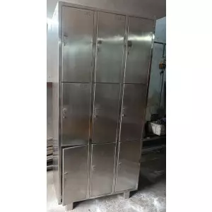 Metal Laboratory Lockers Arranged In Rows Inside An Industrial Storage Room