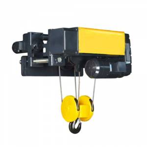 Industrial Electric Hoist Lifting Heavy Load At Factory Site