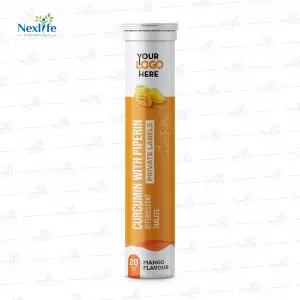 Close-up Of Curcumin Effervescent Tablets Dissolving In Glass Of Water