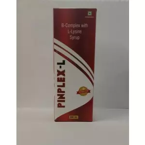 Bottle Of Multivitamin Multimineral Syrup With Label Showing Vitamin And Mineral Content