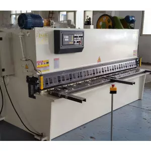 NC Hydraulic Shearing Machine Cutting Metal Sheet In Industrial Workshop