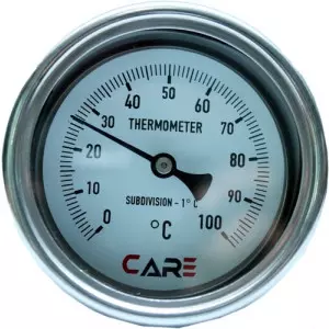 Industrial Temperature Gauge Showing Clear Dial Reading Installed On Factory Equipment