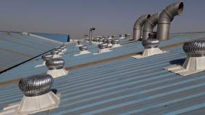 Industrial Air Roof Ventilator Installed On Factory Rooftop Allowing Fresh Air Circulation