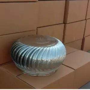 Automatic Turbine Air Ventilator Installed On Industrial Roof Spinning Under Wind