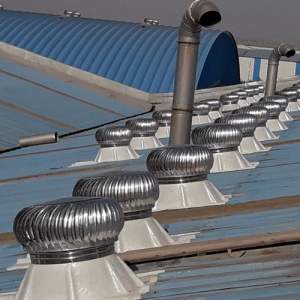 Industrial Roof Air Ventilator Installed On Factory Rooftop Showing Metallic Finish