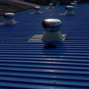Polycarbonate Roof Ventilator Installed On Industrial Building Rooftop