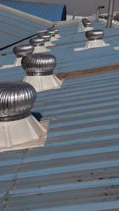 Rooftop Air Ventilator Installed On Industrial Building Roof
