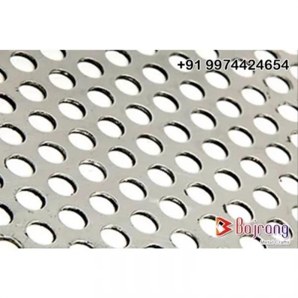 Perforated Metal Sheet With Round Holes Laid Flat Showing Texture And Hole Pattern
