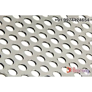 Stainless Steel Perforated Sheet With Round Holes Displayed On Factory Table