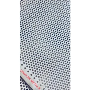 Stainless Steel Perforated Sheet With Round Holes Stacked In Warehouse