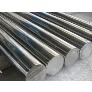 Stainless Steel Rods Stacked In Warehouse Showing Polished Surface