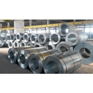 Stainless Steel Coil Stacked In Warehouse Showing Smooth Metal Surface