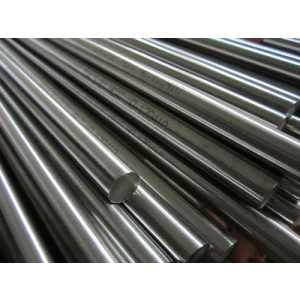 Close-up Of Polished Steel Round Bars Stacked In Warehouse