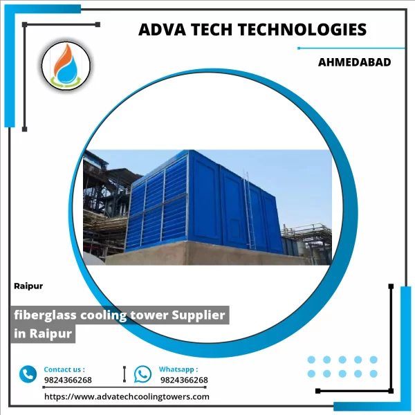 Fiberglass Cooling Tower Installed At An Industrial Site Showing Structure And Fan Assembly