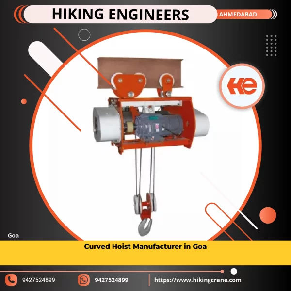 Curved Electric Hoist Lifting Heavy Load In An Industrial Setting