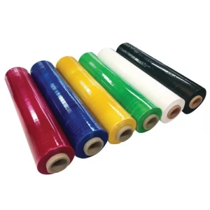 Rolls Of Colored Stretch Film Stacked In Warehouse