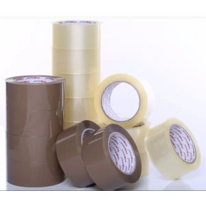Rolls Of Transparent Cello Tape Stacked For Industrial Packaging
