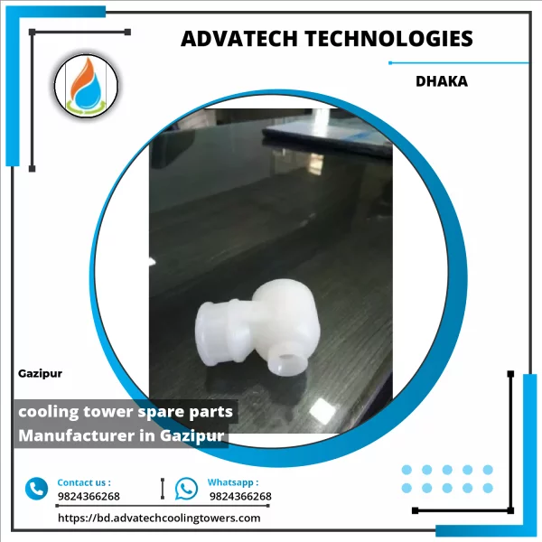 Assorted Cooling Tower Spare Parts Including Fans, Nozzles, And PVC Fills Arranged On Workshop Table