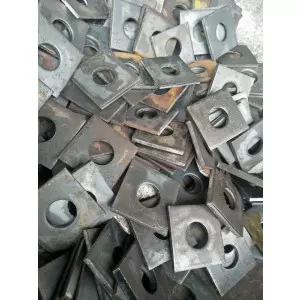 Close-up View Of Mild Steel Square Washer Showing Flat Surface And Sharp Edges