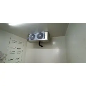 Solar Cold Storage Unit Installed With Visible Solar Panels On Rooftop Under Clear Sky