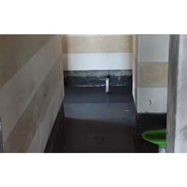 Application Of Bathroom Waterproofing Coating Showing Smooth Finish On Floor Surface