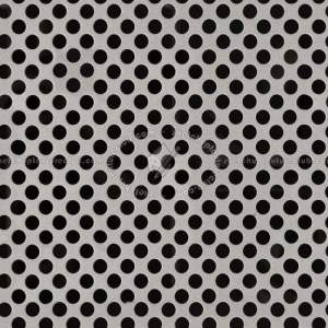 Close-up View Of A Perforated Metal Sheet Showing Precise Round Holes In Mild Steel
