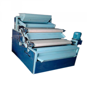 Close-up View Of A Magnetic Roll Separator Showing Rotating Drum With Attached Magnets Used For Metal Separation