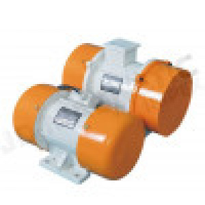 Close-up View Of An Industrial Vibratory Motor With Mounting Brackets