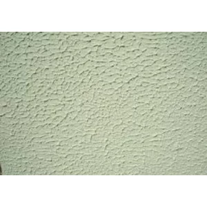 Spray Coat Textured Wall Being Applied With Spraying Equipment