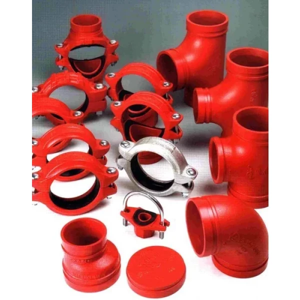 Variety Of Industrial Pipe Fittings Arranged Showing Elbows Tees And Couplings