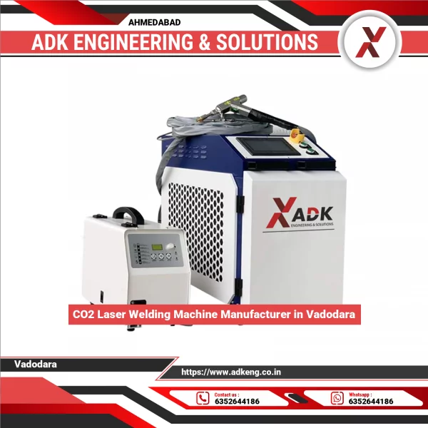 CO2 Laser Welding Machine Operating On Metal Sheet At Industrial Workshop