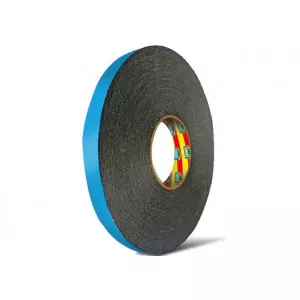 Double Side Blue Gray Foam Tape Roll Lying On Wooden Surface Showing Textured Foam Layer