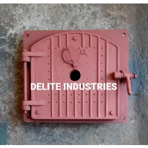 Casting Process Of A Durable Boiler Fire Door Showing Molten Metal Pouring Into Mold