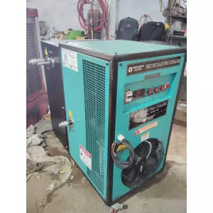 Industrial Water Chiller Unit Installed In A Factory Setting