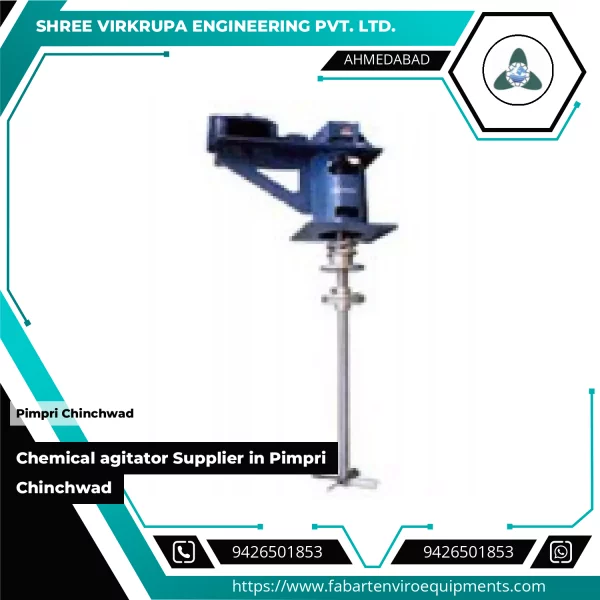 Chemical Agitator Installed In Industrial Tank Showing Rotating Blades