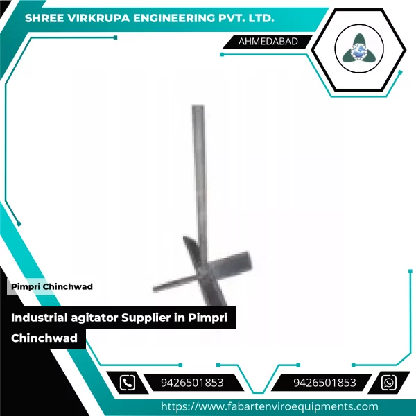 Industrial Agitator Mounted On Stainless Steel Tank Used In Manufacturing Process